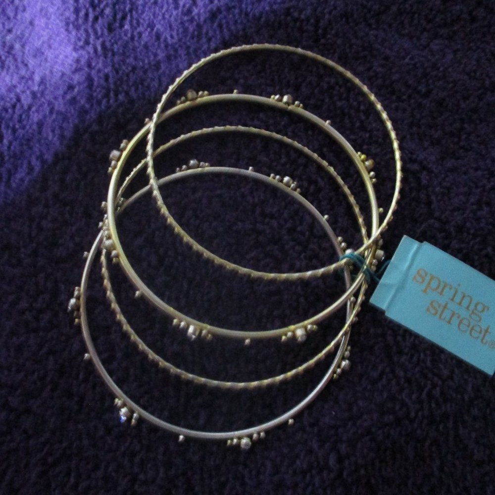 Set of 4 Gold Toned Bangle Bracelets